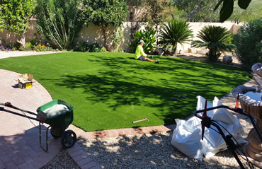 Customer installing artificial grass